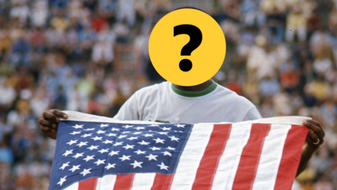 Player holds up an American flag