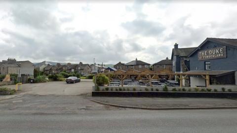Google streetview of the rear of the pub showing the car park and beer garden