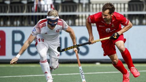 England's Sam Ward and Belgium's Florent van Aubel challenge for the ball