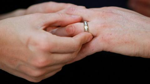 Same-sex marriage ceremony - wedding ring, file pic