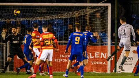 Partick Thistle Goalkeeper Jamie Sneddon scores a dramatic late equaliser during a cinch Championship match between Cove Rangers and Partick Thistle at the Balmoral Stadium