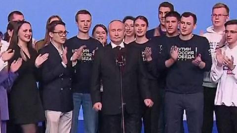 President Putin surrounded by supporters