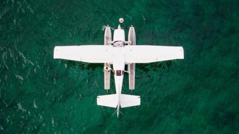 Seaplanes are pictured on Lake Geneva prior to taking off during a meeting of the Swiss Association of Seaplane Pilots (SPAS) in Perroy, Switzerland, 24 June 2017