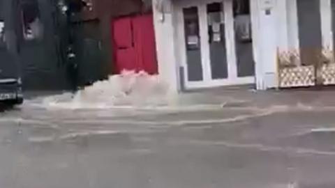Water gushing down Eastborough in Scarborough's town centre