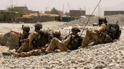 Handout photo issued by the MoD of British soldiers from 3 Para and 1 Royal Irish conducting clearance patrols in and around the town of Sangin, Helmand Province, Afghanistan