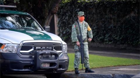 A soldier stands guard after Mexico City's Public Security Secretary Omar Garcia Harfuch was wounded in an attacked in Mexico City, on June 26, 2020