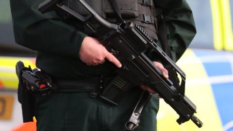 File photo dated 23/2/2023 of an armed Police Service of Northern Ireland officer