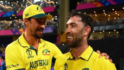 Australia's Glenn Maxwell celebrates his match-winning double century against Afghanistan at the 2023 Cricket World Cup with team-mate Mitchell Starc