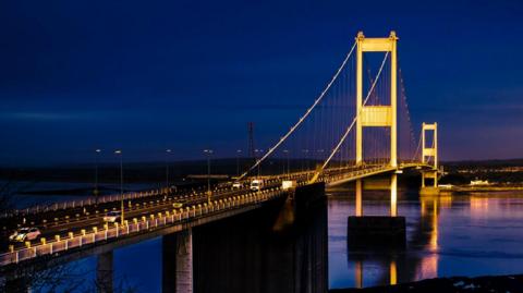 The M48 Severn crossing seen at night with the structure illuminated