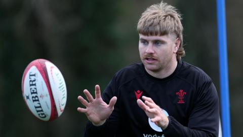 Dragons number eight Aaron Wainwright training with Wales