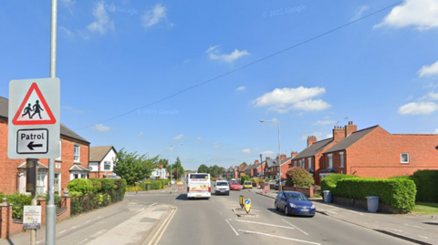 A view of London Road in Balderton at the junction the collision happened on a sunny day, with light traffic