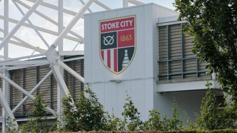 The outside of Stoke City's bet365 Stadium, with the club's new crest for the 2026-27 season onwards visible on the exterior