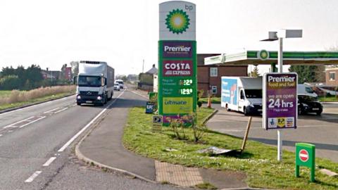 Street view of the A47 with the BP garage and Thorney Toll service building on the right 