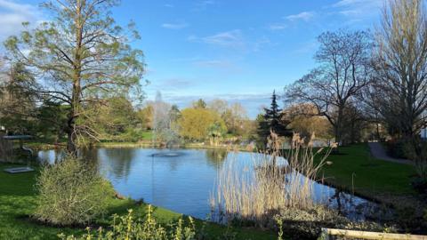 A view of a lake on the University of Surrey campus