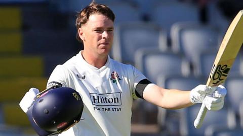 Marcus Harris celebrates scoring a century