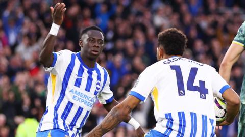 Yankuba Minteh celebrates a goal against Tottenham