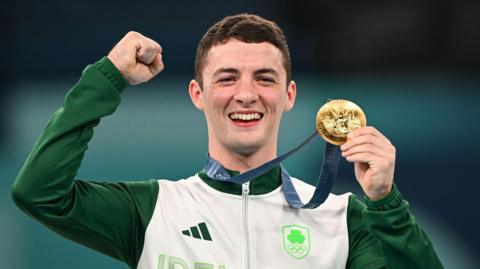 Rhys McClenaghan with his Olympic medal
