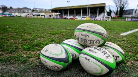 Mennaye Field with rugby balls in foreground