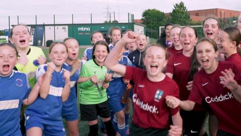 Wales and England girls celebrate together