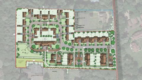 A birdseye view of an artists impression of plans for 49 homes on unused land. The picture shows road layout and plots for houses and gardens.