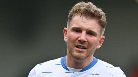 Ben Whitfield in action for Barrow during his spell on loan
