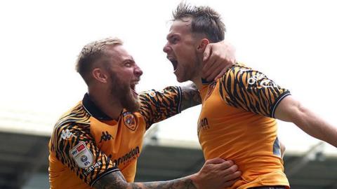Ollie McBurnie, left, and Joe Gelhardt, right, celebrate after Gelhardt scores for Hull City