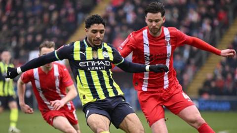 Jack Simpson in action against Manchester City in the FA Cup