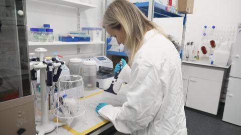 A woman in a lab