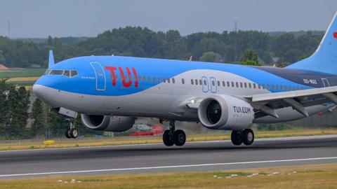 TUI plane lands on runway