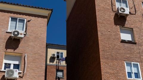 Air conditioning units on the exterior of apartment buildings in Madrid, Spain