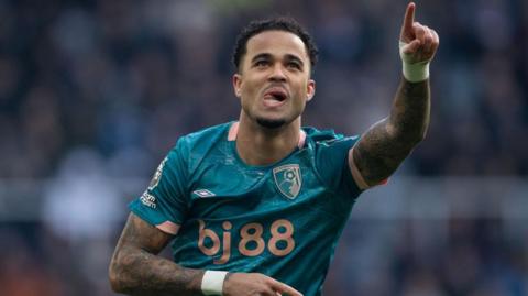 Justin Kluivert celebrates after scoring for Bournemouth against Newcastle in the Premier League