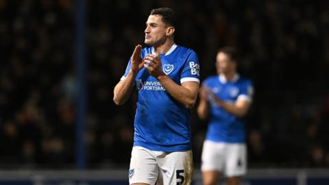 Regan Pole claps fans