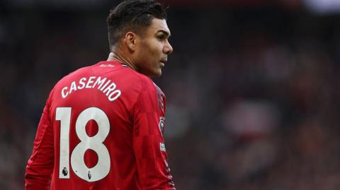 A picture of Casemiro playing for Man Utd against Manchester City at Old Trafford in January in which you can see his shirt number 18