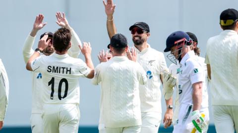 NZ's Nathan Smith celebrates dismissing Cade Carmichael