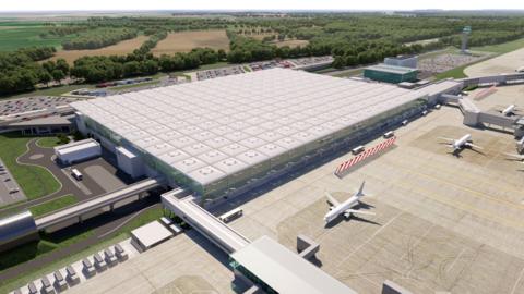 A CGI image of how the expanded airport will look. The main terminal building has a large white roof. To the right is where the planes are based. In the background there are car parks.