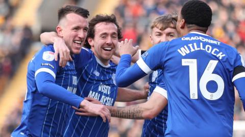 David Turnbull (left) celebrates his goal for Cardiff