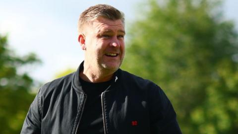 Karl Robinson smiling