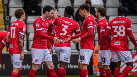 Morecambe playing against Sutton