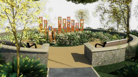 Artist impression of the planned memorial garden in Northern Cemetery in Hull. It has brown steel pillars with coloured shapes surrounded by plants and trees with a low circular wall and seating