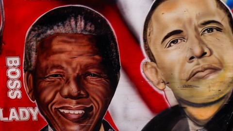 Artwork on a bus in Kenya depicting late South African President Nelson Mandela and former US President Barack Obama, whose later father was Kenyan. 