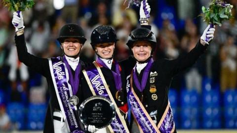 Charlotte Fry on the podium at the 2026