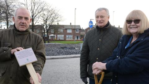 Councillors Ernest Gibson, Ken Dawes and Doreen Purvis preparing to plant a tree