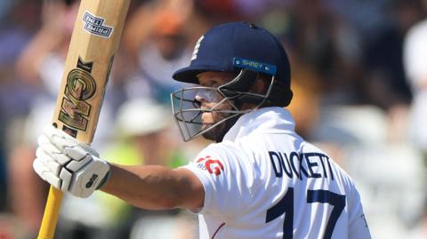 England opener Ben Duckett raises his bat after hitting fifty