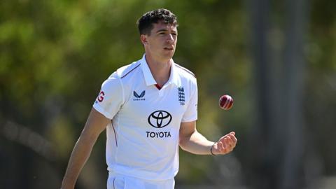 Matthew Fisher wearing an England shirt