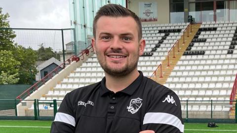 Elliot Powell smiles for the camera