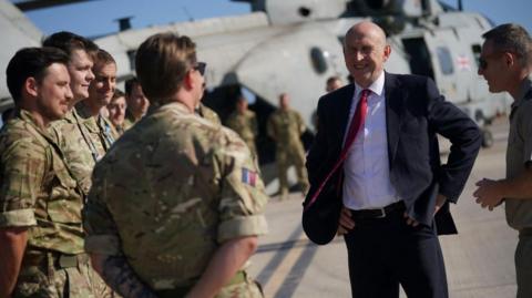 John Healey with troops at RAF Akrotiri in Cyrprus