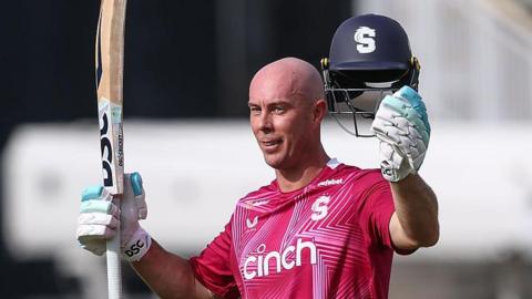 Northamptonshire batter Chris Lynn raises his bat and helmet as he celebrates scoring a century against Warwickshire, at Edgbaston on Sunday 31 May 2026