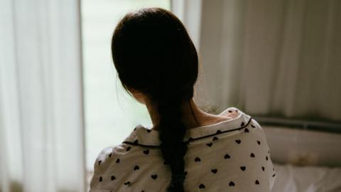 Generic picture of a teenager in bedroom