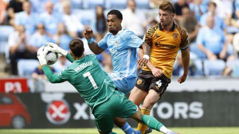 Coventry City and Hull City in action in the Championship