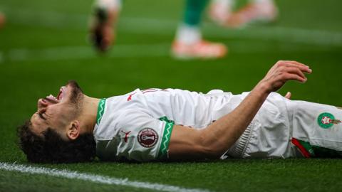 A Morocco player looks dejected after Afcon final defeat